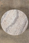 Round Footed Plate in Grey Travertine, top view