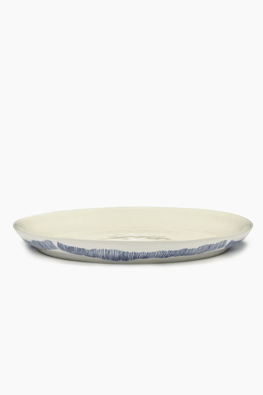 Small Serving Plate, White Swirl with Blue Stripes Ottolenghi Serax, side view